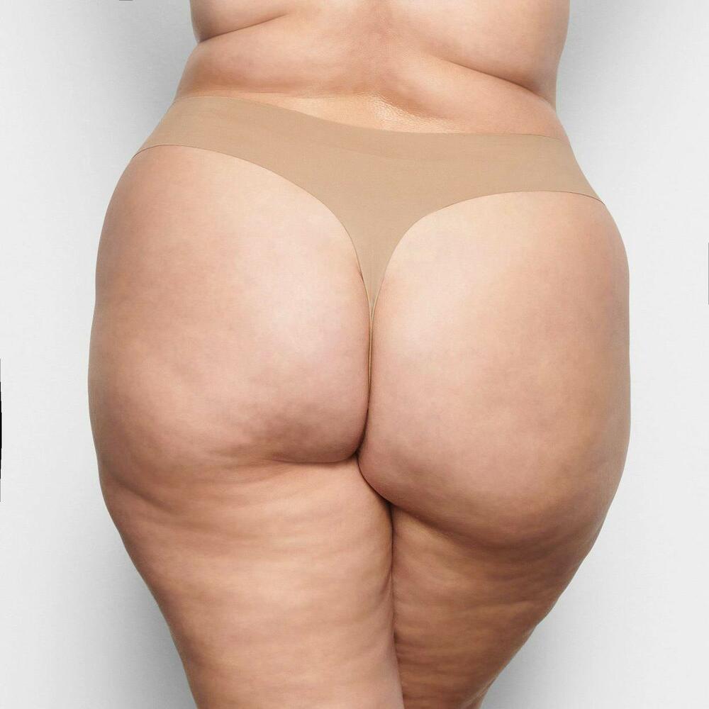 Трусики naked dipped thong Clay, S